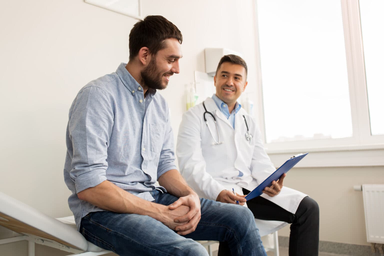 Doctor and patient talking Image